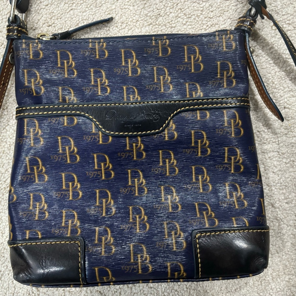 Dooney and Bourke 1975 vintage cross body handbag.